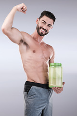 Image showing Protein shake, fitness and health with portrait of man for workout, muscle and bodybuilder. Diet, gym and training with athlete and powder for sports, exercise and nutrition in gray studio background