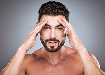 Image showing Skincare, acupressure and health, portrait of man with hands on head and hair or beard maintenance. Fitness, health and spa facial care, male model with muscle in studio isolated on grey background.