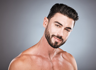 Image showing Skincare, smile and health, portrait of man with happy face, hair and beard growth and maintenance. Fitness, health and spa facial care, male model with muscle in studio isolated on grey background.