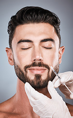 Image showing Face injection, man and plastic surgery for skincare, collagen and beauty clinic in studio. Cosmetics, needle and male aesthetic for body transformation, botox change and facial prp on background