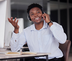 Image showing Call center, black man and communication for customer service, telemarketing and crm help desk in office. Sales agent, consultant and tech support for questions, lead generation or telecom consulting