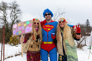 Image showing Peoples in mask attend Masopust or the Mardi Gras carnival, traditional ceremonial door-to-door procession. 