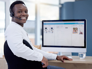 Image showing Call center, computer and black man consultant, telemarketing agent or ecommerce communication worker. Website screen, technical support and telecom person portrait. virtual consulting or contact us