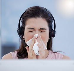 Image showing Customer service, covid and blowing nose with a woman consultant working in a call center while sick. CRM, telemarketing and cold or flu with a female sneezing while consulting using a headset