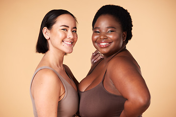 Image showing Friends, diversity and beauty of plus size women in studio isolated on a brown background. Empowerment portrait, underwear and body positive happy girls with makeup, cosmetics and healthy skincare.