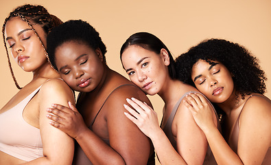 Image showing Hug, diversity and portrait of women in underwear for sleep isolated on a studio background. Friends, embrace and models with body positivity, lingerie and confidence in a collaboration on a backdrop