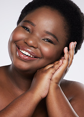 Image showing Black woman, hands and smile for gentle skincare beauty, cosmetics or makeup against a gray studio background. Portrait of happy African American female touching face for natural self love or care