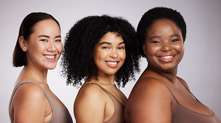 Image showing Women, diversity studio portrait and smile for aesthetic, beauty or race equality with plus size solidarity. Model, asian and black woman with cosmetic, makeup and wellness with support for inclusion