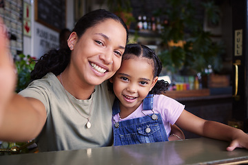 Image showing Cafe, black family and selfie with a mother and daughter enjoying spending time together in a coffee shop. Portrait, kids and smile with a woman and happy female child bonding in a restaurant