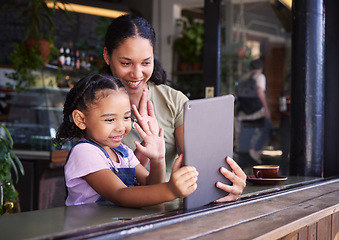 Image showing Video call, restaurant and woman and girl with a tablet waving on social media, online and app at a coffee shop. Kid, daughter and child with parent on the internet for communication and talking