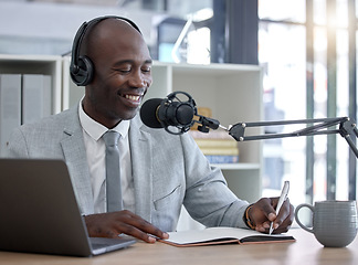 Image showing Radio host, black man and networking with laptop, smile and writing for interview, speaking and business influencer. Presenter, African male and speaker with notebook, microphone and audio broadcast