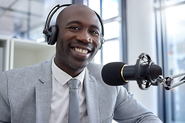 Image showing Radio, portrait and black man on microphone, professional podcast or content creation in business office broadcast. Virtual reporter, news speaker or journalist speaking on live streaming audio show