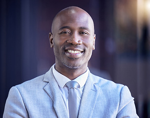 Image showing Portrait, mission or leadership and a business black man in his office with a mindset of future growth. Face, vision and motivation with a male employee looking confident while working as a manager