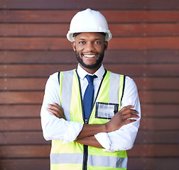 Image showing Black man, construction worker or arms crossed portrait with building planning ideas, industrial ideas or property vision. Smile, happy or architect engineer in confidence in architecture renovations