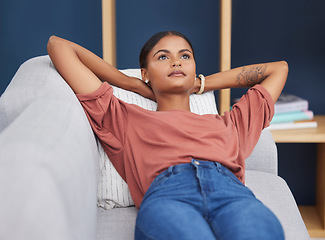 Image showing Relax, thinking and black woman on sofa for afternoon nap or rest in calm apartment on weekend. Sleep, daydream idea and girl on couch relaxing on lunch break in stress free and zen time to chill.