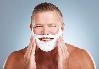 Image showing Shaving cream, portrait and happy old man in studio for skincare, grooming and beauty on grey background. Face, foam and hair removal for mature model smile for facial, skin or product while isolated