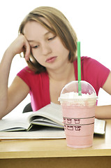 Image showing Teenage girl with milkshake