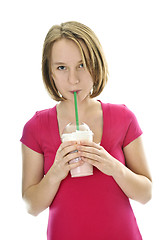 Image showing Teenage girl with milkshake