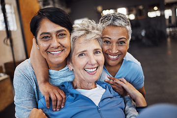 Image showing Mature women, portrait and hug in gym, workout or training healthcare wellness, bonding activity or exercise class. Smile, happy and retirement fitness friends in diversity group or community support