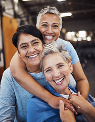 Image showing Mature women, portrait or hug in training, workout or gym for healthcare wellness, bonding goals or exercise class. Smile, happy or retirement fitness friends in diversity group or community support
