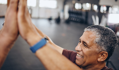 Image showing Senior man, high five and exercise in gym, smile and achievement for workout goal and target. Mature male, athlete and gesture for celebration, winning and fitness with support, happiness or wellness