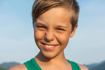 Image showing Closeup portrait of a boy in summer day.