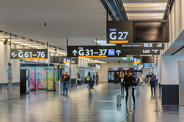 Image showing Peoples walking in Vienna airport terminal