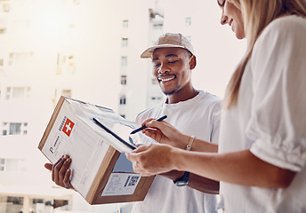 Image showing Black man, tablet or woman signing for delivery, courier parcel or cardboard box package in house or home. Smile, happy or postal worker technology for customer signature, shipping or logistics order