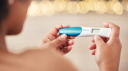 Image showing Pregnancy test, woman and hands check results of medical information at home. Closeup, fertility stick or family planning for maternity wellness, pregnant hormone or ivf healthcare treatment for baby