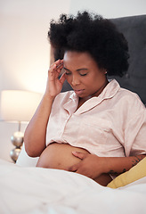 Image showing Pregnant, headache and black woman with depression, bedroom and stress with cramps, frustrated and healthcare. Pregnancy, African American female and lady with anxiety, mental health and discomfort