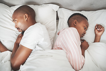 Image showing Insomnia, stress and black couple in bed, angry argument about relationship, sad breakup or divorce in apartment. Mental health, depression and toxic marriage, woman ignoring man in bedroom in home.