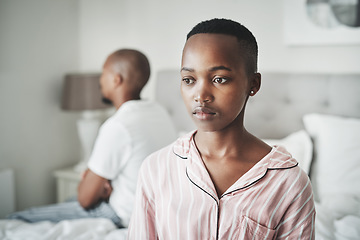 Image showing Stress, depression and insomnia, black couple on bed in home angry after argument or fight. Mental health, relationship and divorce problem, woman and man frustrated and depressed in bedroom thinking