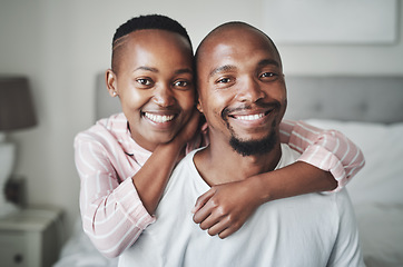 Image showing Black couple, hug and smile in portrait with love and care at home, relax and commitment with healthy relationship. Happy people, partnership and trust with loyalty, support and affection and peace