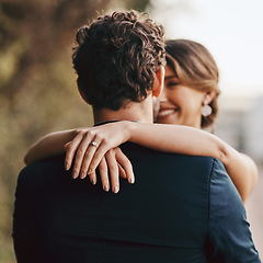 Image showing Couple hug outdoor, wedding and marriage with love and relationship commitment, partnership and respect. Life partner, happiness and groom with bride hands and ring, loyalty with happy people