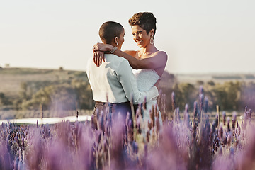 Image showing Woman, lesbian couple and hug in embrace for LGBT relationship, wedding or marriage commitment in nature. Happy gay married women hugging, smiling and enjoying romantic celebration in the countryside