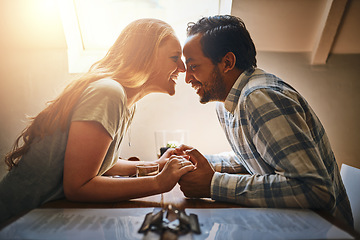 Image showing Love, holding hands and couple on table at restaurant, laughing at funny joke and bonding. Valentines day, romance diversity and affection, passion or care of man and woman enjoying date time at cafe