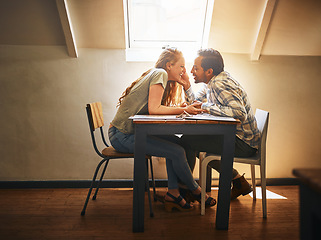 Image showing Valentines love, couple and holding hands at restaurant on table, talking and laughing at joke. Real, romance diversity and affection of man and woman on date, having fun and enjoying quality time,