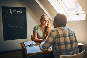 Image showing Date, happy couple and people at lunch or breakfast at a cafe or restaurant together enjoying quality time. Valentines day, man and woman sitting at a table at a coffee shop with happiness and love