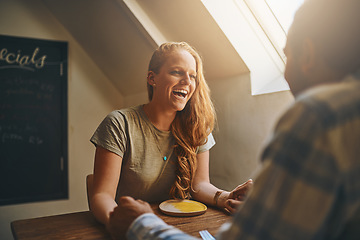 Image showing Date, happy and woman laugh at joke at lunch in a cafe or restaurant enjoying quality time. Valentines day, funny and people sitting at a table in a coffee shop with love together in the morning