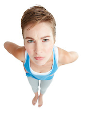 Image showing Top view, angry and portrait of confused woman on white background with attitude, hands on hip and anger. Body language, mockup space and face of upset, annoyed and frustrated girl isolated in studio