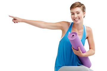 Image showing Yoga, pointing and woman isolated on a white background with training gear for product placement on mockup. Happy fitness, exercise or workout person in pilates, sports portrait show space in studio