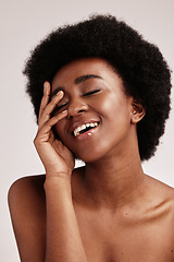 Image showing Beauty, black woman and skincare of a young person face with hands happy about facial. Wellness, cosmetics and model in a isolated studio with a smile doing dermatology, detox and spa self care