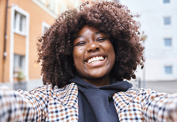 Image showing Black woman, portrait and selfie in city, urban town or fun in Kenya. Happy young african female smile in video call, photograph or face of happiness, curly afro hair and freedom on social media blog