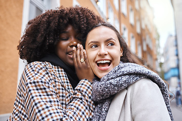 Image showing Woman, friends and gossip in the city whispering in the ears for secret conversation or discussion. Happy, shocked or surprised women in private communication, announcement or secrets in the street