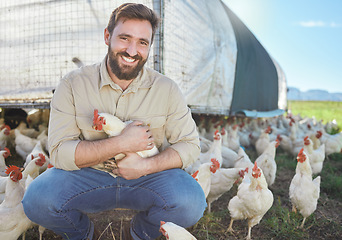 Image showing Chicken, portrait and farmer on livestock farm for sustainable, agriculture and environmental farming. Eco friendly, organic and agro man with poultry animal for his industry business in countryside.