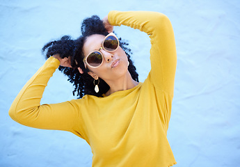 Image showing Fashion, sunglasses and black woman with kiss face, summer style and beauty with hairstyle on blue background. Fun, pose and African American model, trendy and stylish with designer brand mockup