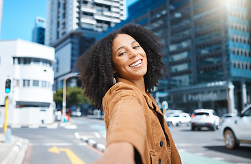 Image showing Selfie, urban city and black woman for travel, fashion influencer and social media update of journey in street. Walking, carbon capture and happy person in road with portrait or profile picture