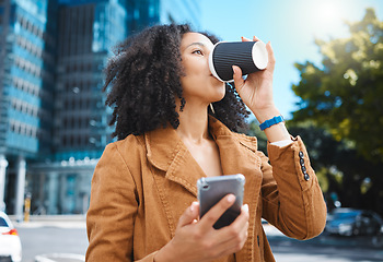 Image showing Drinking coffee, commute and woman with a phone for social media, email and communication in city. Thinking, contact and girl with a drink in the street with a mobile for a website and gps in Norway