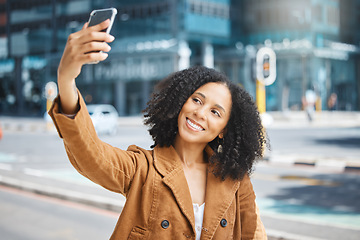 Image showing Travel, selfie and black woman in a city, happy and smile on vacation against urban background. Blog, social media and girl influencer live streaming trip in New York for online, followers or network