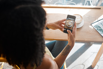 Image showing Cafe, coffee and woman taking a picture on a phone in morning for breakfast on vacation. Cafeteria, photography and female taking a photo of latte or cappucino on cellphone in restaurant on a holiday